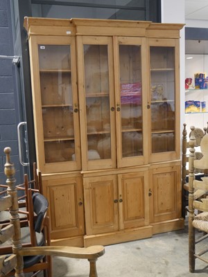 Lot 1169 - Early 20th century pine glazed display cabinet...