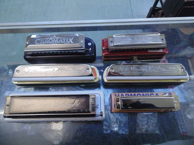 Lot 385 - Six cased harmonicas to include 'The Larry...