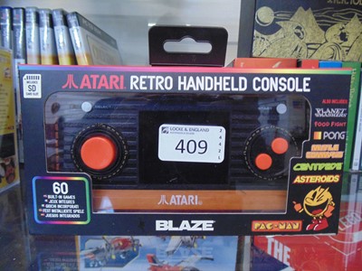 Lot 409 - A boxed Atari retro handheld console