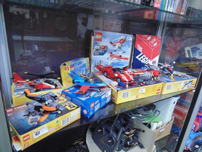 Lot 411 - An assortment of boxed part built LEGO sets...