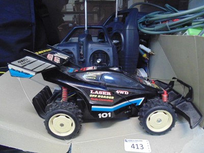 Lot 413 - An offroad remote control car with two...