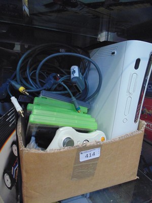 Lot 414 - An XBOX 360 console along with controller and...