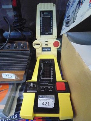 Lot 421 - A Galaxy Invader handheld video game along...