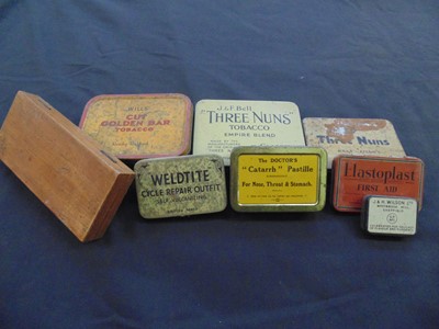 Lot 431 - A box containing a quantity of old tins