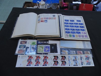 Lot 438 - Two stamp albums together with an assortment...