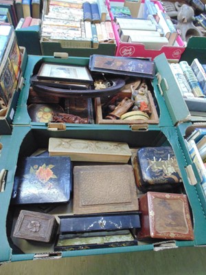 Lot 474 - Two trays of decorative storage boxes, carved...