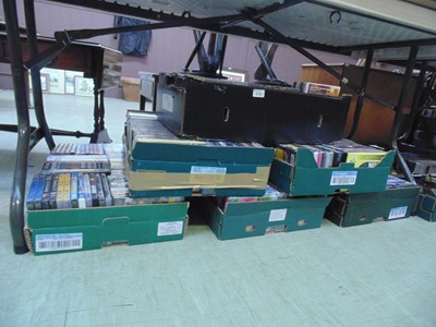 Lot 144 - Six trays containing a large quantity of DVDs...