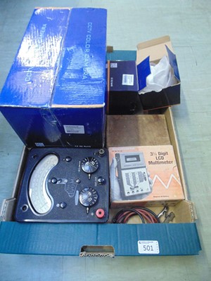 Lot 501 - A tray containing old electrical items, boxes...