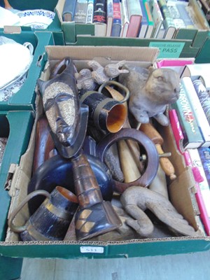 Lot 511 - A tray of carved wooden items to include...