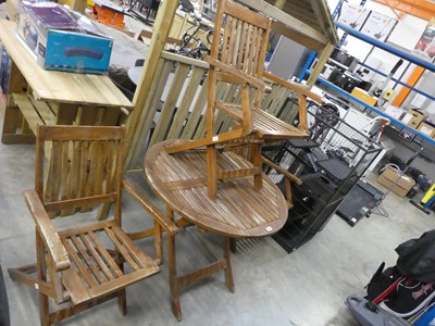 Lot 2167 - Teak slatted circular garden table with 3...