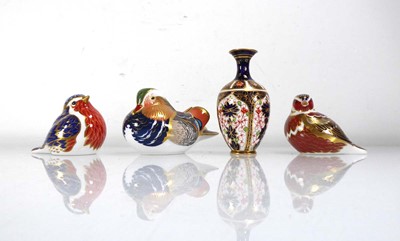 Lot 145 - Three Royal Crown Derby paperweights, modelled...