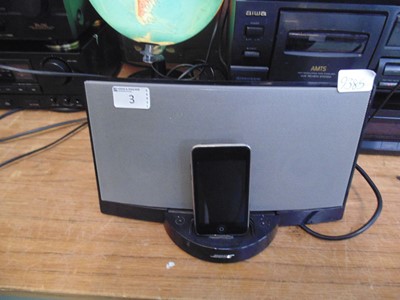 Lot 3 - A Bose docking station along with an Ipod