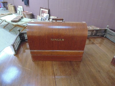 Lot 36 - A dome cased Singer manual sewing machine (No...