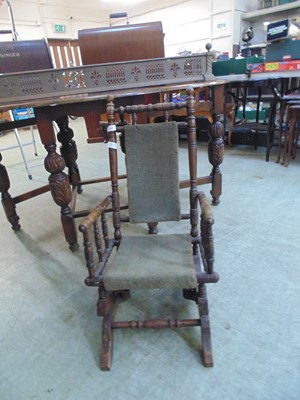 Lot 40 - A child's American style rocking chair