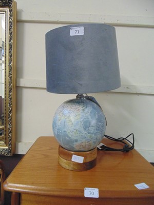 Lot 71 - A modern table lamp in the form of a globe