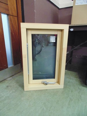 Lot 77 - A pair of unused pine framed windows