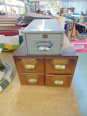 Lot 86 - An early 20th century wooden four drawer index...