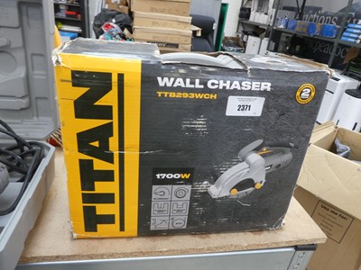 Lot 2371 - Cased Titan 240V wall chaser