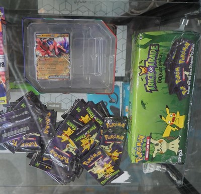 Lot 1779 - Pokemon tin - only containing Koraidon EX card,...