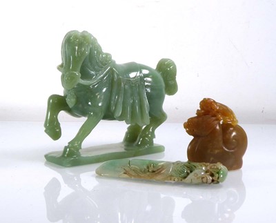 Lot 314 - A green hardstone carved modelled as a...