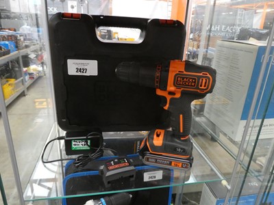 Lot 2427 - Cased Black & Decker combi drill with battery...