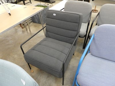 Lot 2463 - Charcoal grey upholstered lounge chair on...