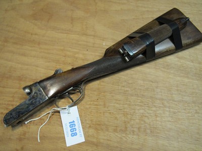 Lot 1668 - (S2)The stock, action, and forend of a 28 bore...