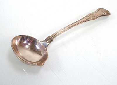 Lot 491 - A George IV silver Kings pattern sauce ladle,...