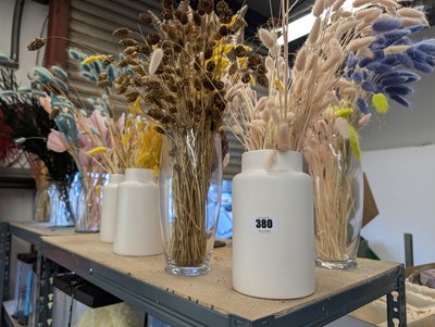 Lot 380 - 17 assorted vases containing dried flowers...