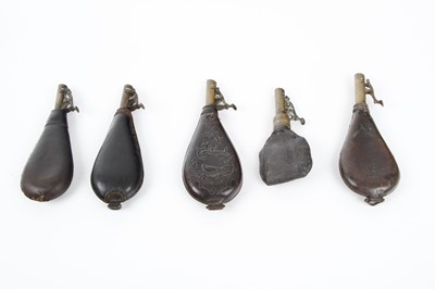 Lot 6 - Five leather shot flasks some with embossed...