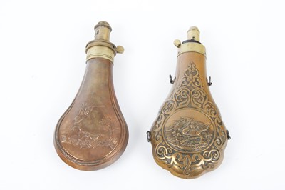 Lot 16 - Two copper and brass powder flasks with...