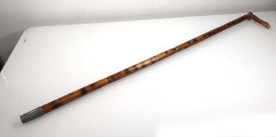 Lot 127 - An Edwardian bamboo walking stick with silver...