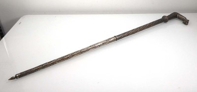 Lot 128 - An Eastern metalware walking stick with...