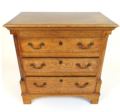 Lot 11 - A George II/III oak and crossbanded chest of...