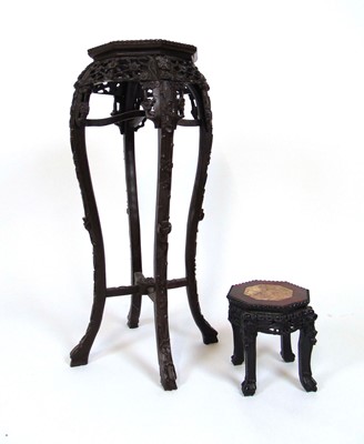 Lot 18 - A Chinese Export jardiniere stand with a rouge...