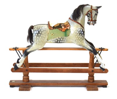 Lot 62 - An Ayres dapple grey rocking horse on a twin...