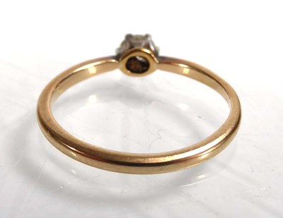 Lot A yellow metal ring set small diamond in a six...