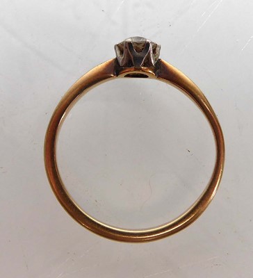 Lot A yellow metal ring set small diamond in a six...