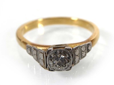 Lot A yellow metal ring set small diamond in an...