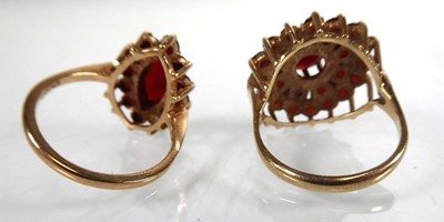 Lot Two 9ct yellow gold dress rings set garnet,...