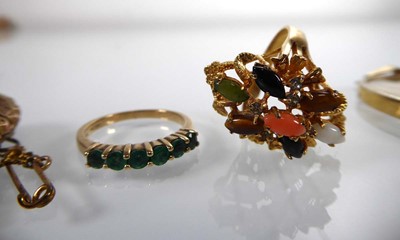 Lot A 9ct yellow gold ring set six emeralds and a...