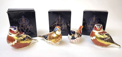 Lot 216 - Four Royal Crown Derby paperweights in the...