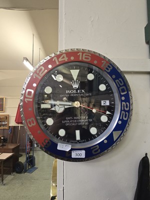 Lot 300 - A 'Rolex' style GMT-Master II design wall...