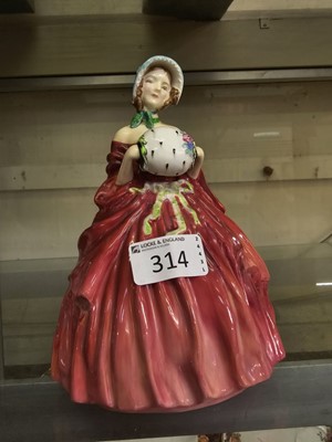 Lot 314 - A Royal Doulton ceramic figurine 'Genevieve'...