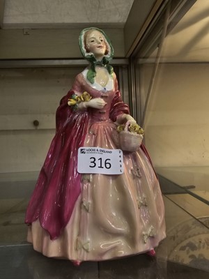 Lot 316 - A Royal Doulton ceramic figurine 'Rosebud'