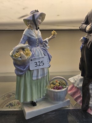 Lot 325 - A Royal Doulton ceramic figurine 'Springflowers'