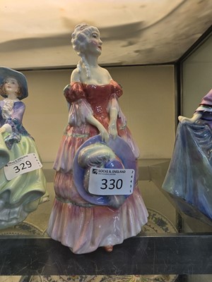 Lot 330 - A Royal Doulton ceramic figurine 'Veronica'...