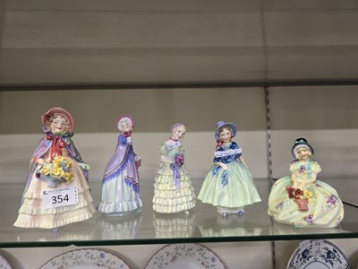 Lot 354 - Five Royal Doulton ceramic figurines 'Granny's...