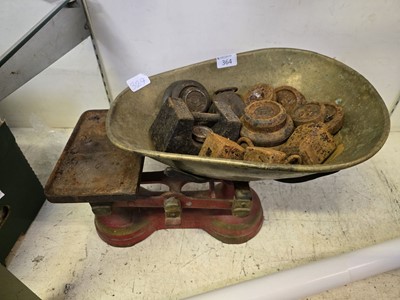 Lot 364 - A red painted set of cast metal balance scales...