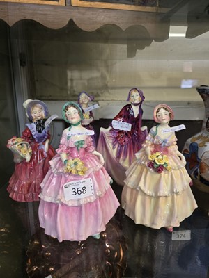 Lot 368 - Five Royal Doulton ceramic figurines 'Irene'...